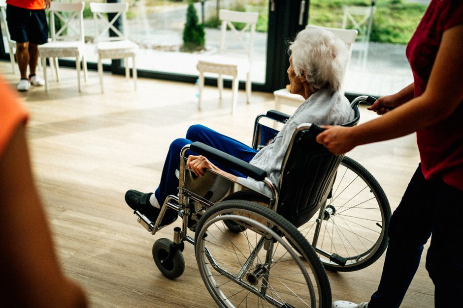 Episode 5: The 2:00 PM Shift Handover Blindspot A caregiver assists a senior adult in a wheelchair at a nursing home in Prague, Czech Republic.