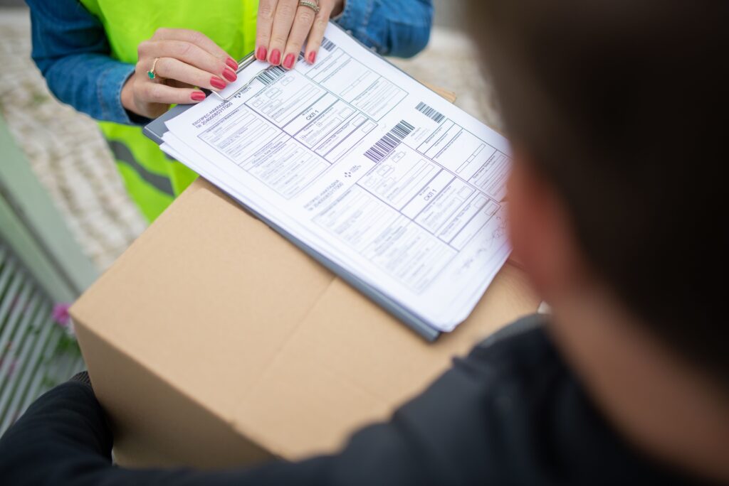 Episode 3: The Case of the Missing RM50,000 Delivery Order Courier hands over a package for delivery with signing of receipt documents.